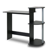 A modern black and silver computer desk equipped with shelves for additional storage and workspace efficiency.